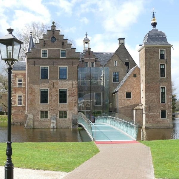 Forest path and historic castle in the Achterhoek during a peaceful weekend getaway