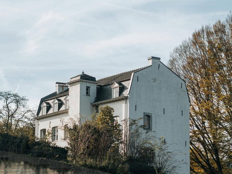 Green hills, village and walking trail in South Limburg on a sunny holiday day